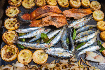 assortiment de poissons et de légumes à la plancha