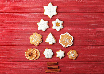 Tasty Christmas homemade cookies on color wooden background