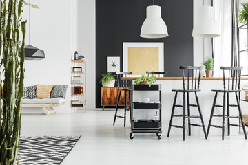 Spacious room with bar stools