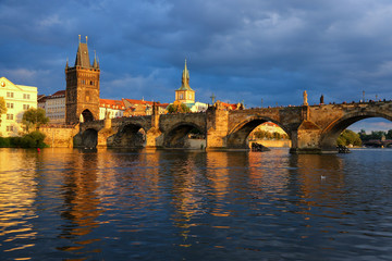 Fototapeta na wymiar Charles Bridge in Prague as seen from a cruise on the Vltava river