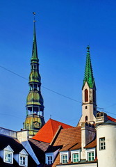 Obraz premium Roofs, dormers and church towers (Old Riga, Latvia)