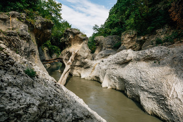 Beautiful natural mountain canyon with a mountain river