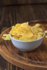 Corn flakes in bowl - cereal breakfast.