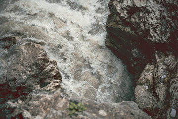 Boiling water in the mountain river in the gorge