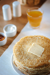 Hip of thin russian pancakes, called blini, at restaurant.
