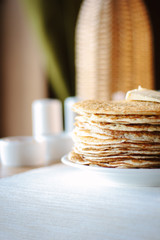 Stack or pile of pancakes at russian restaurant.