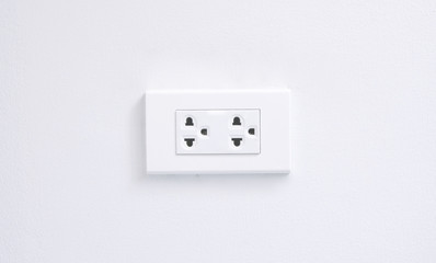 electric plugs on white wall