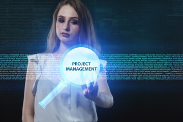 The concept of business, technology, the Internet and the network. A young entrepreneur working on a virtual screen of the future and sees the inscription: Project management