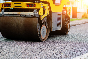 Background of asphalt roller that stack and press hot asphalt. Road repair machine