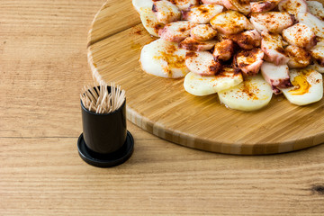 Pulpo a la gallega. Galician octopus on wood. Typical spanish food
