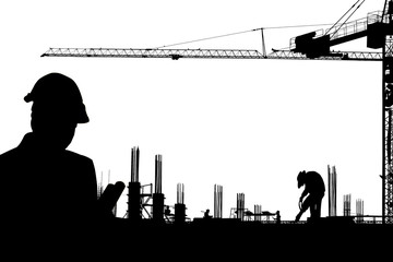 Silhouette construction engineer in the process of checking the construction site