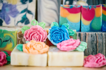 Handmade Soap with bath and spa accessories. Dried lavender and rose petals. Carve and draw a pattern on the soap.