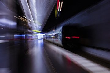 Fototapeta premium fast train passing by subway station 