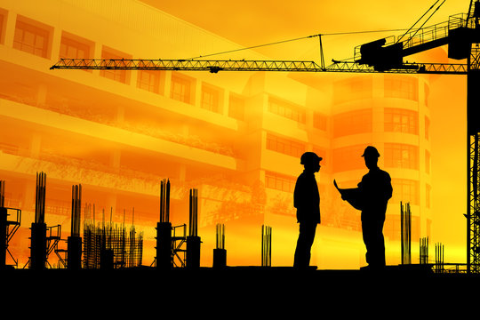 Silhouette architect and construction worker with building background