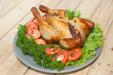 grilled chicken on wooden table