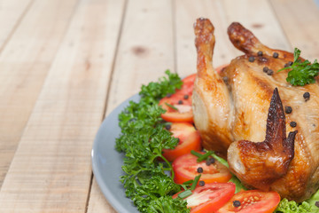 grilled chicken on wooden table