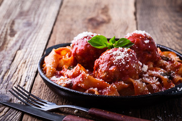 Homemade  traditional Italian pasta pappardelle with meatballs