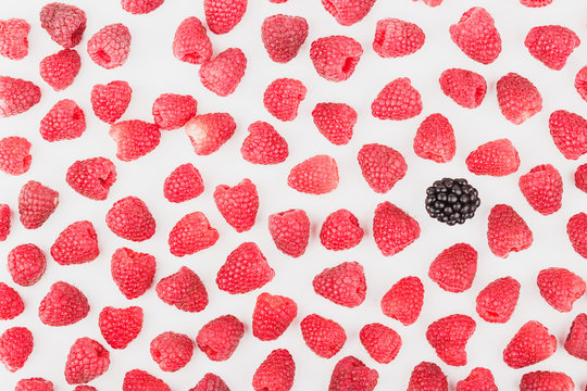 Background from raspberries and blackberries, isolated