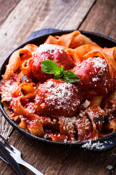 Homemade  traditional Italian pasta pappardelle with meatballs