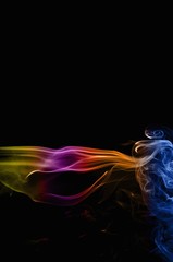 Abstract colorful smoke on black background, smoke background,colorful ink background,Yellow, Violet, Orange, Blue,beautiful color smoke