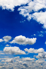 Obraz premium Bright blue sky with white clouds