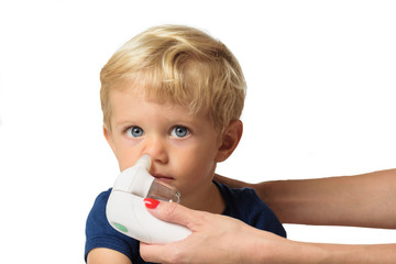 mother cleaning kid boy nose