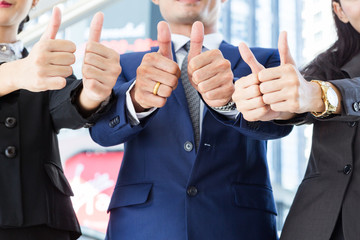 thumbs up from business peoples