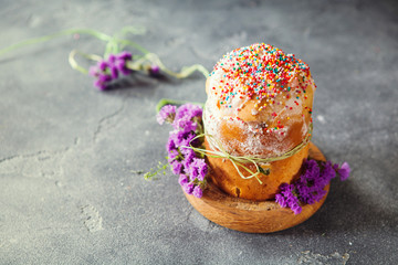 Kulich cake with young green sprigs
