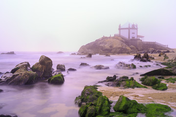 Church Lord of the Stone in Porto, Portugal surround by fog