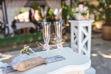 Champagne glasses with decoration for a wedding ceremony