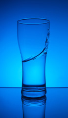 Glass and splash of water
