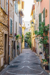 Fototapeta na wymiar Picturesque small alleyway in Antibes, Cote d'Azur, France