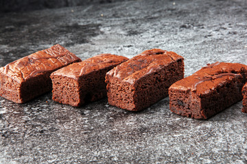 homemade chocolate brownies on grey vintage background, chocolate cake concept
