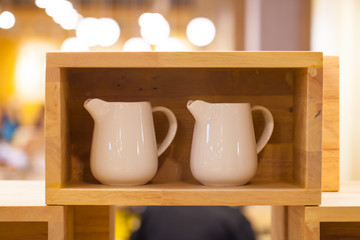 Container of Condiment Cup in wooden box
