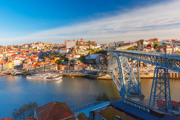 Douro river, Ribeira and Dom Luis I or Luiz I iron bridge in the sunny morning Porto, Portugal.