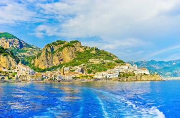 View of Amalfi village on a sunny day along Amalfi Coast in Italy.