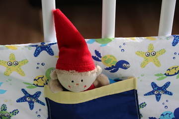 funny toy puch clown looking out of a pocket © Pascal