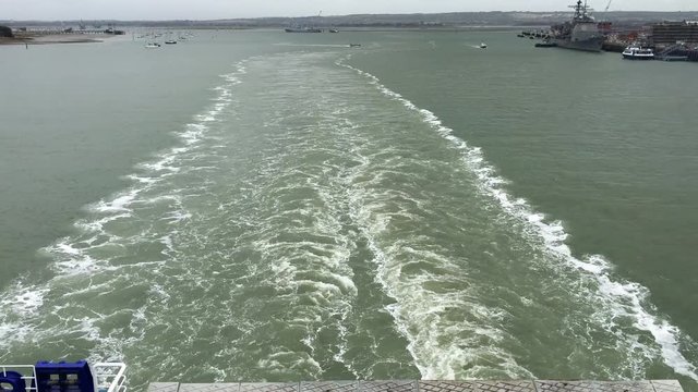 Looking at a car ferry wake with large waves. Passenger ferry from Portsmouth to Caen