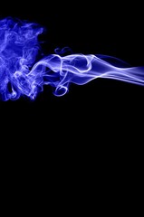 Abstract blue smoke on black background,blue ink background