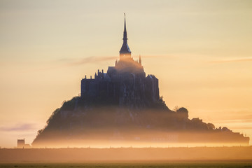Fototapeta premium Mont Saint-Michel view in the sunrise light. Normandy, northern France