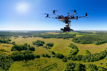 Fototapeta na wymiar Agriculture drone on the green tea field