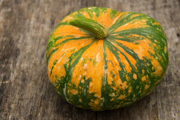 Pumpkin on rustic wooden table