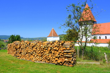 Fortified medieval saxon church in the village Merghindeal- Mergenthal, Transylvania,Romania
The...