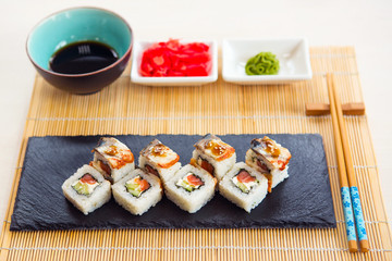 Sushi roll sushi with fish, cream cheese and vegetables. Sushi menu. Japanese food