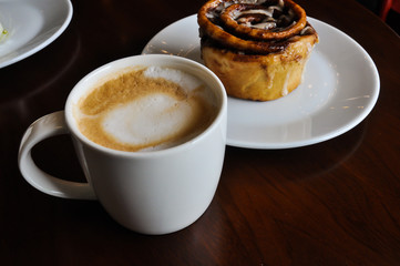 warm cup of coffee in cofee shop
