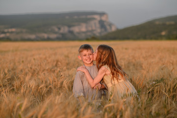 Beautiful children play outdoor. Children in vintage village.