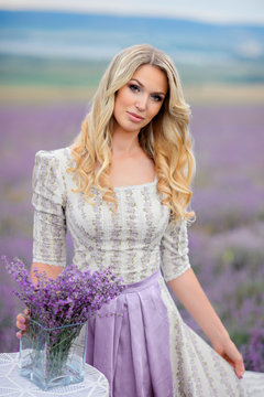 Woman walk in the field of lavender