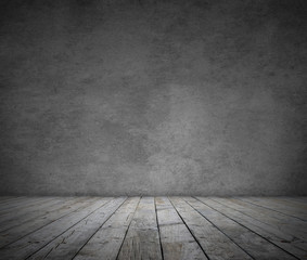 Empty grey wooden floor boards and gray textured stone wall background