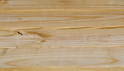Pine wood plank table surface from an angle