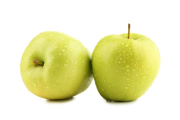 Green apples with water drops isolated on white background
